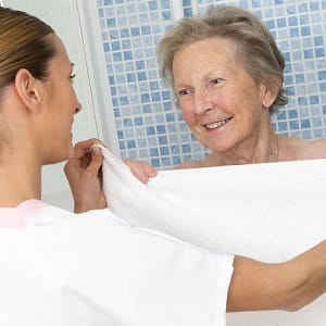 Support image of PROPHARM GEL shower with old person.